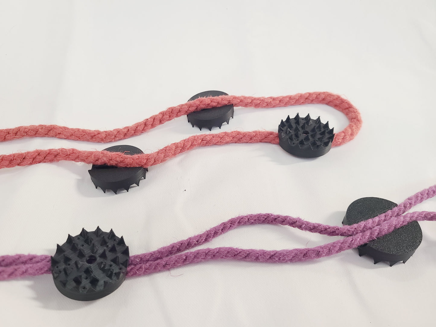 BDSM Rope Spikes: Accupressure Discs with a built-in channel for Shibari