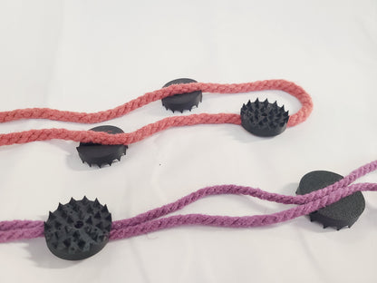 BDSM Rope Spikes: Accupressure Discs with a built-in channel for Shibari
