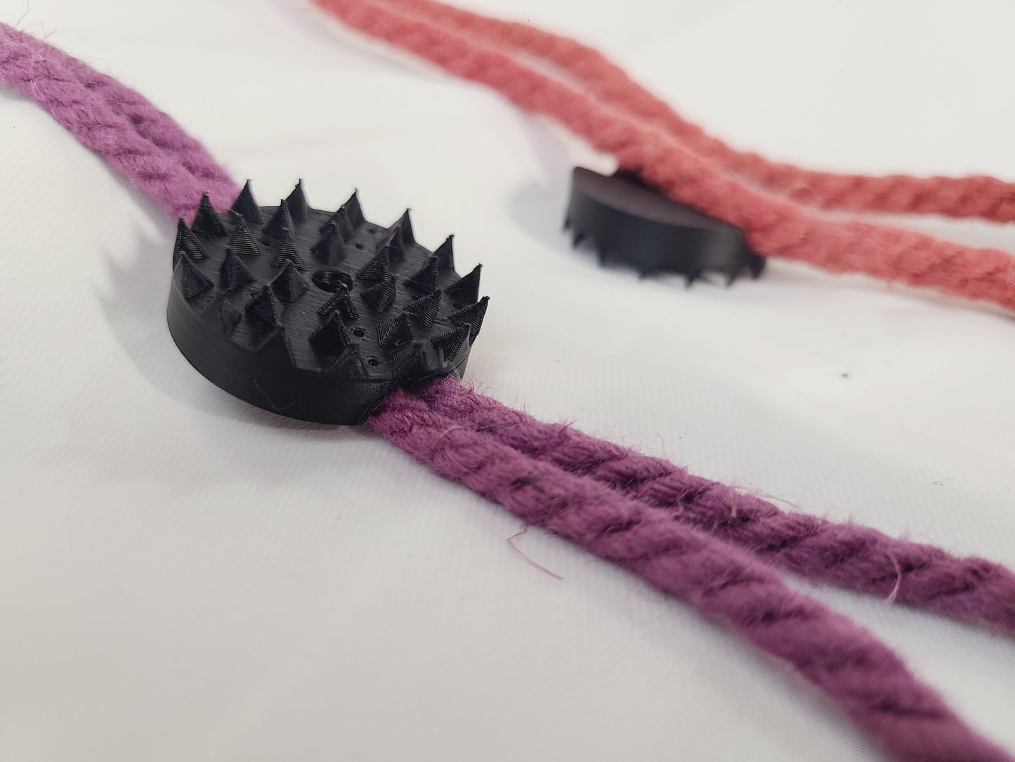 BDSM Rope Spikes: Accupressure Discs with a built-in channel for Shibari