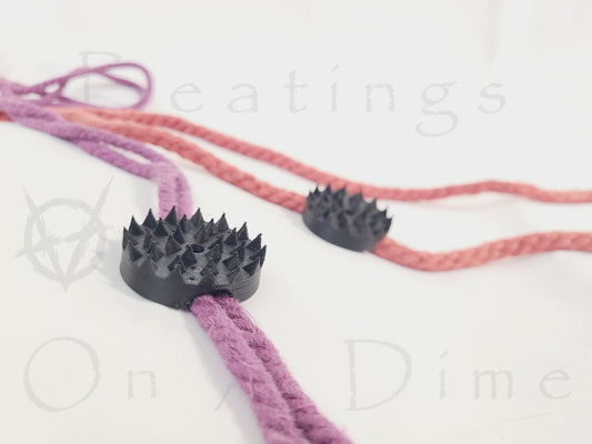 BDSM Rope Spikes: Accupressure Discs with a built-in channel for Shibari